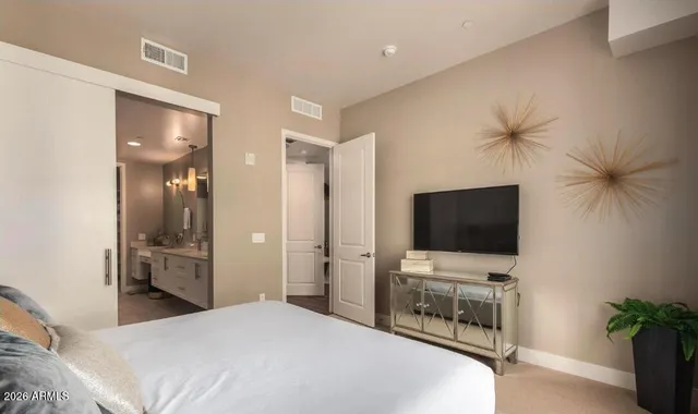 a bathroom with a double vanity sink mirror and double