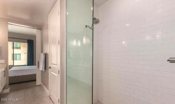 a bathroom with a double vanity sink mirror and double