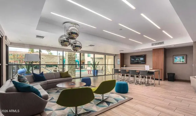 a view of a building with sitting area