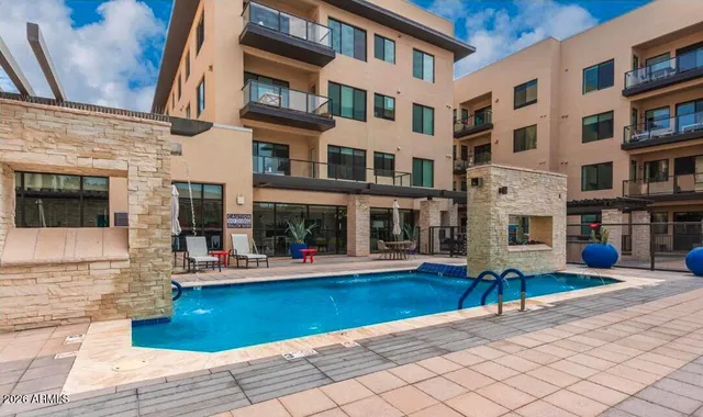a outdoor space with lots of tables and chairs