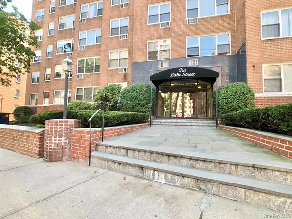 a view of a building with a street