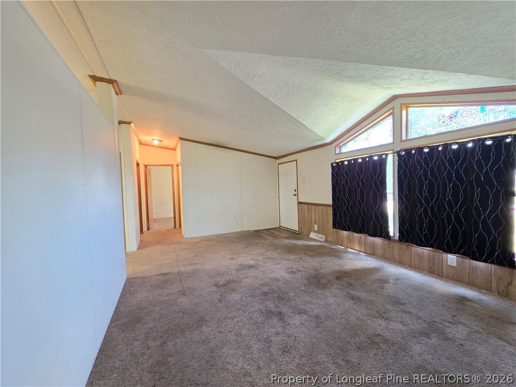 124 Franklin Road Raeford, NC 28376 - Photo 5 of 15 a view of an empty room