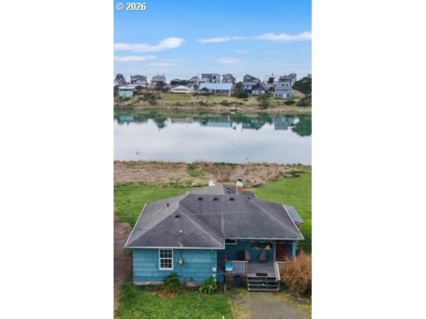 a picture of a house with a yard