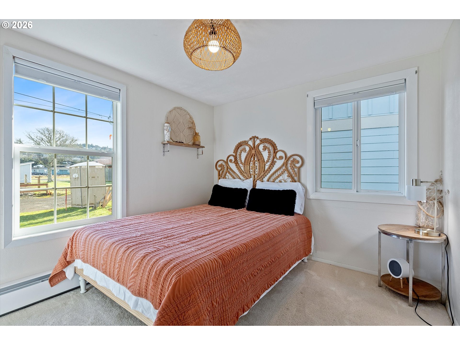35160 Rueppel Avenue Pacific City, OR 97135 - Photo 15 of 34 a bedroom with a bed and a window