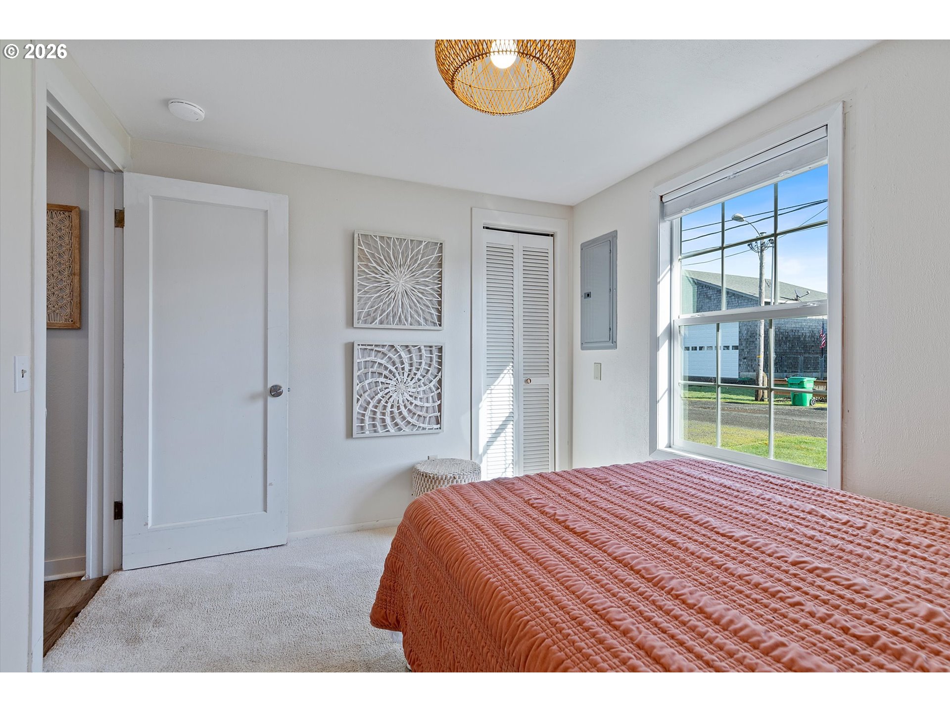 35160 Rueppel Avenue Pacific City, OR 97135 - Photo 16 of 34 a bedroom with a bed and a window