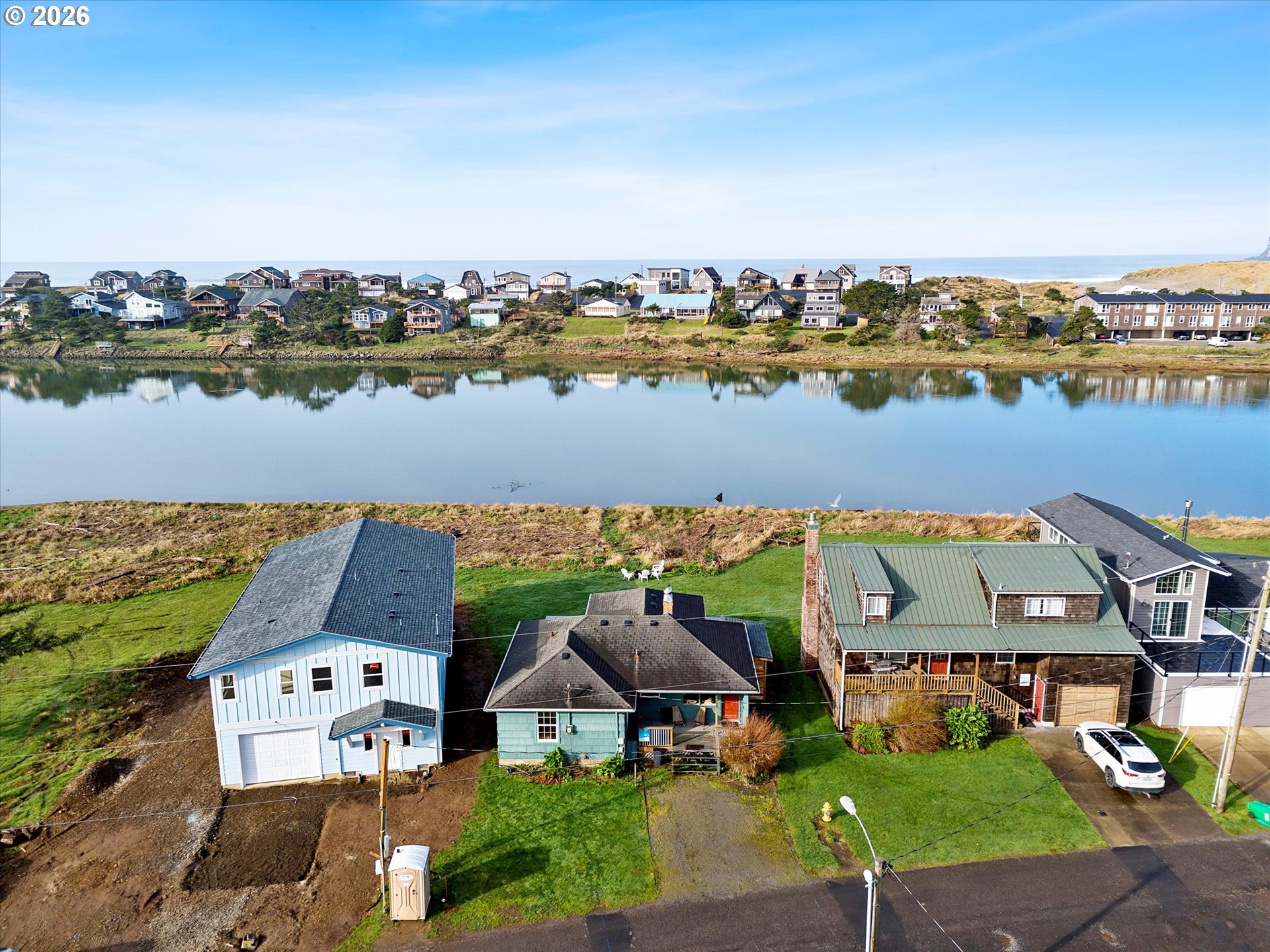 35160 Rueppel Avenue Pacific City, OR 97135 - Photo 22 of 34 an aerial view of a house with a lake view
