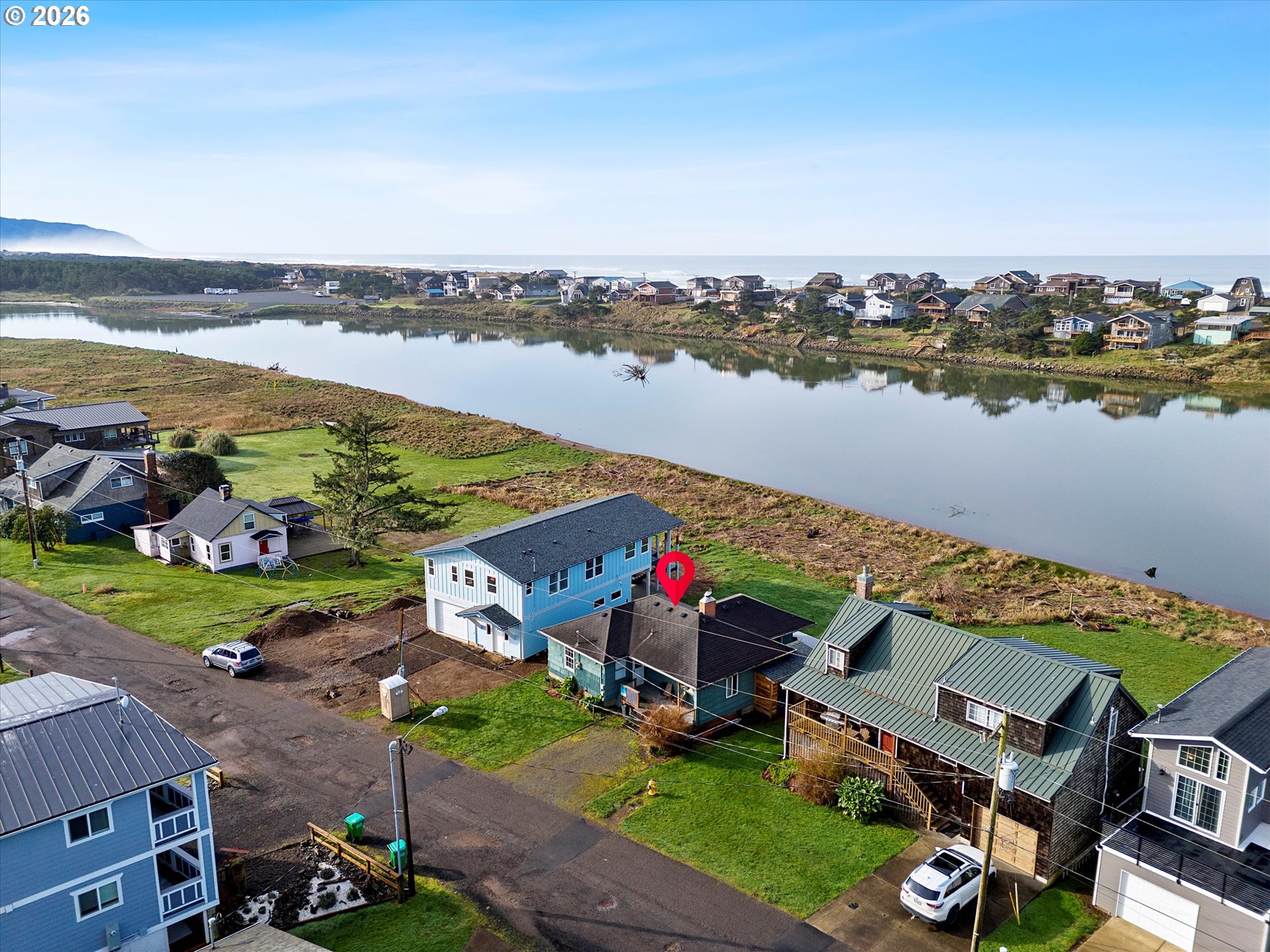 35160 Rueppel Avenue Pacific City, OR 97135 - Photo 25 of 34 an aerial view of a house with a lake view