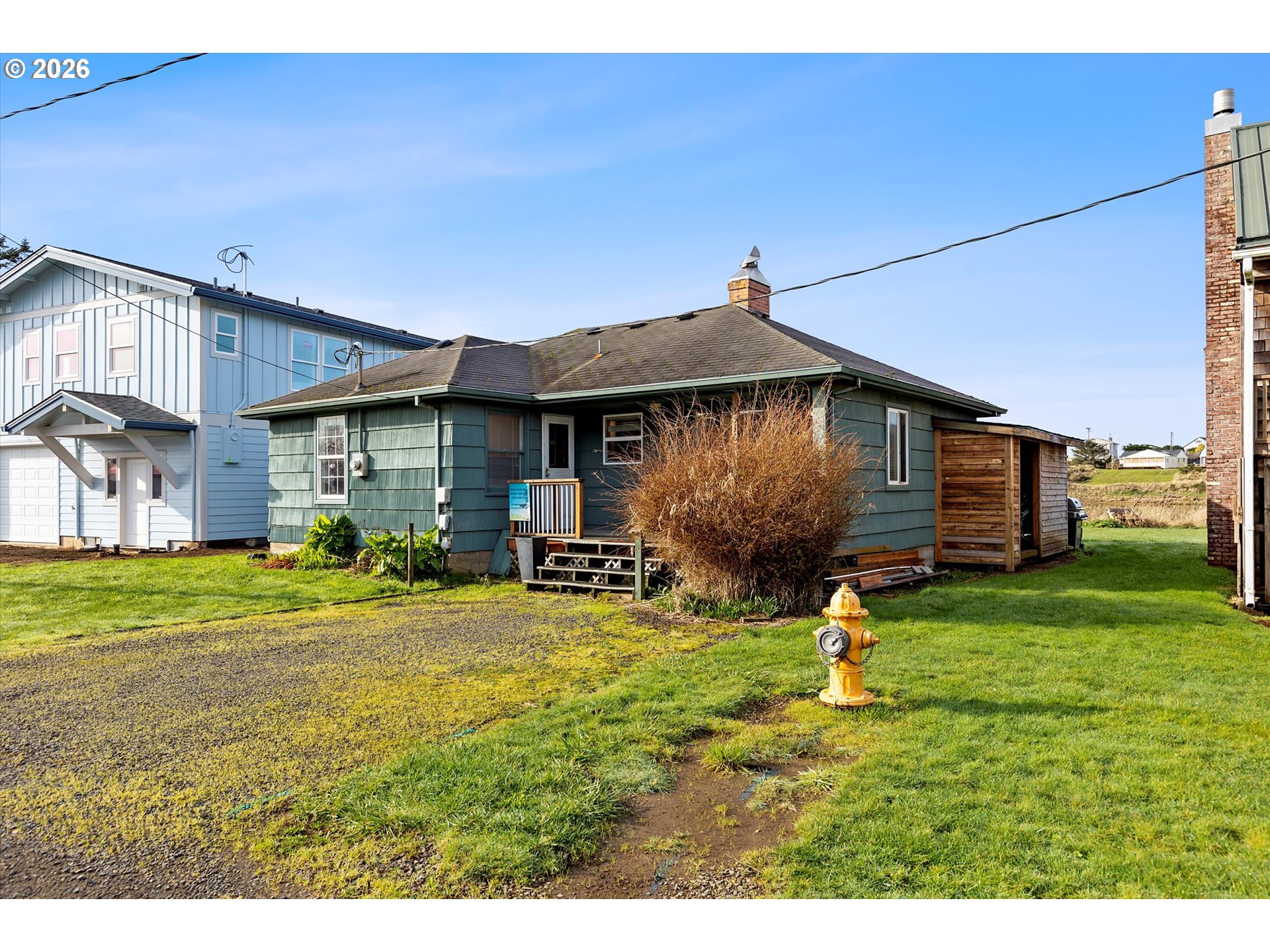 35160 Rueppel Avenue Pacific City, OR 97135 - Photo 30 of 34 a front view of a house with garden and porch
