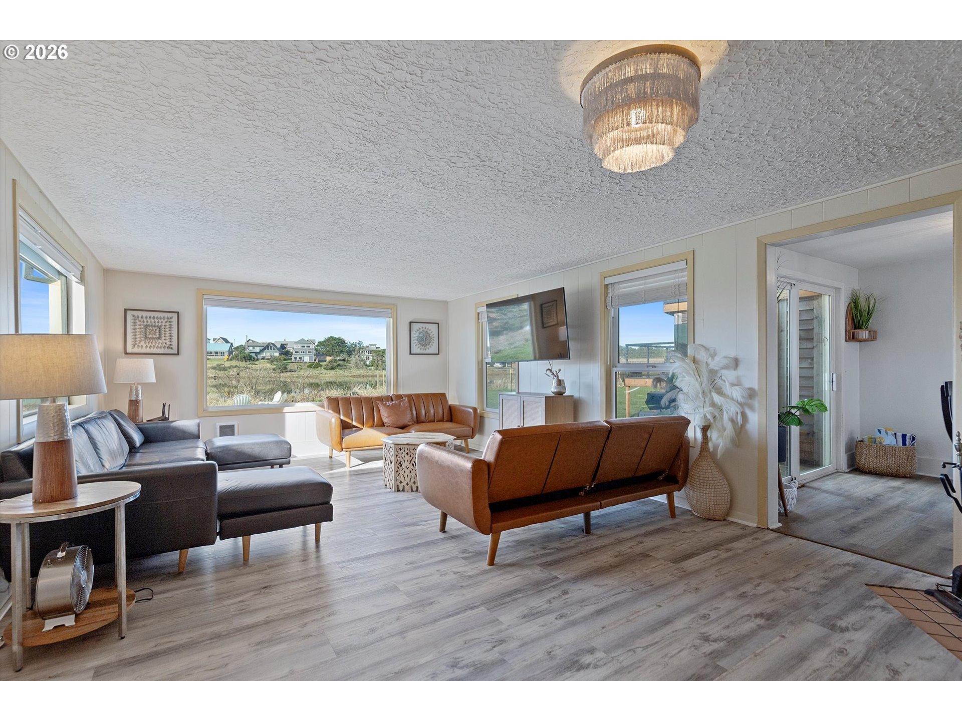 35160 Rueppel Avenue Pacific City, OR 97135 - Photo 6 of 34 a living room with furniture and a large window