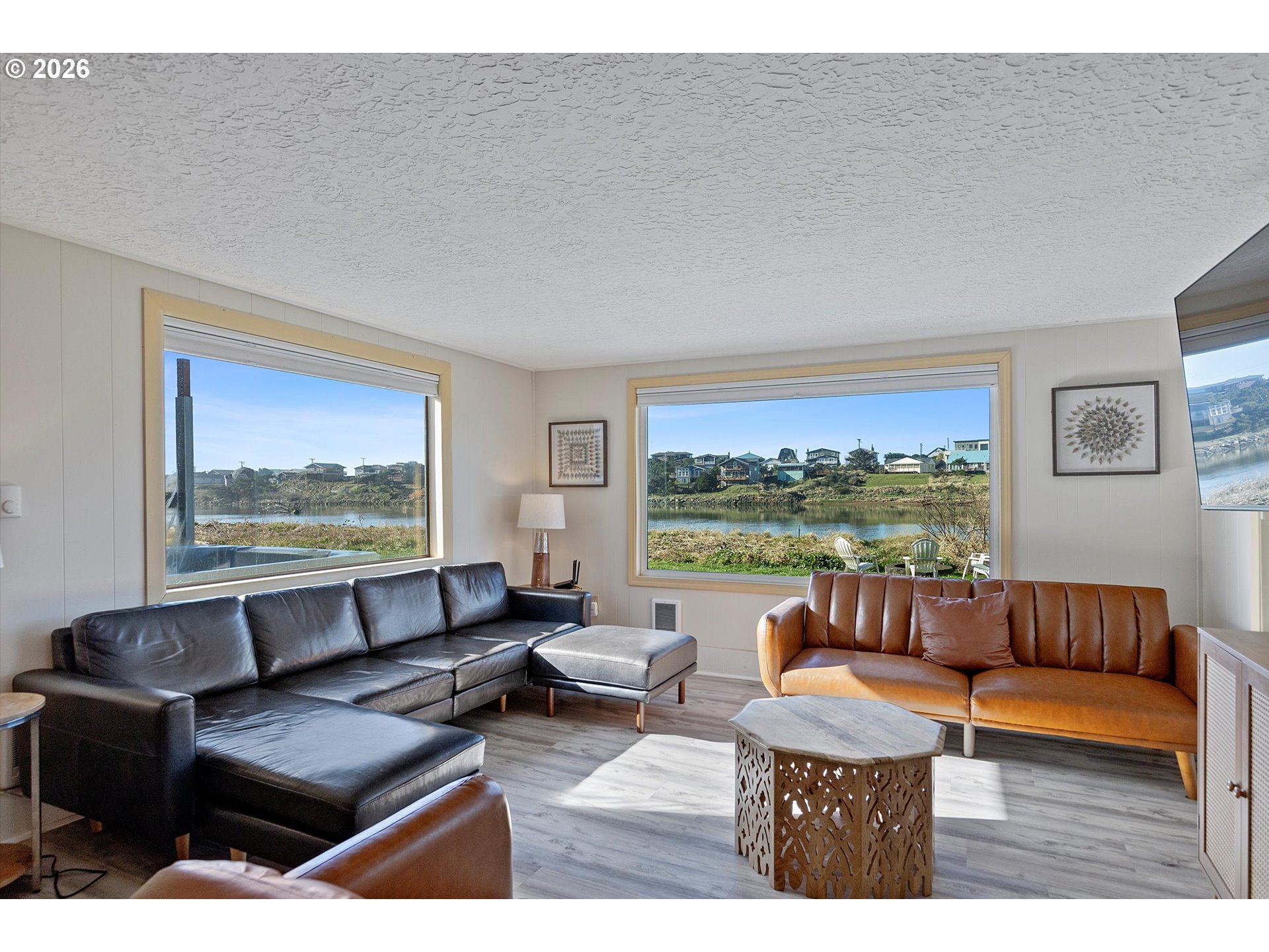 35160 Rueppel Avenue Pacific City, OR 97135 - Photo 9 of 34 a living room with furniture and a large window