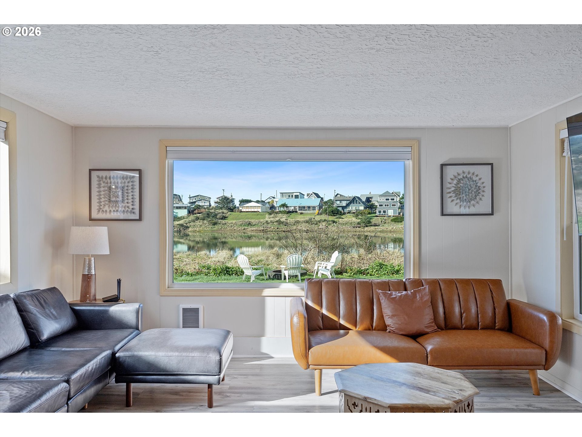 35160 Rueppel Avenue Pacific City, OR 97135 - Photo 10 of 34 a living room with furniture and a large window