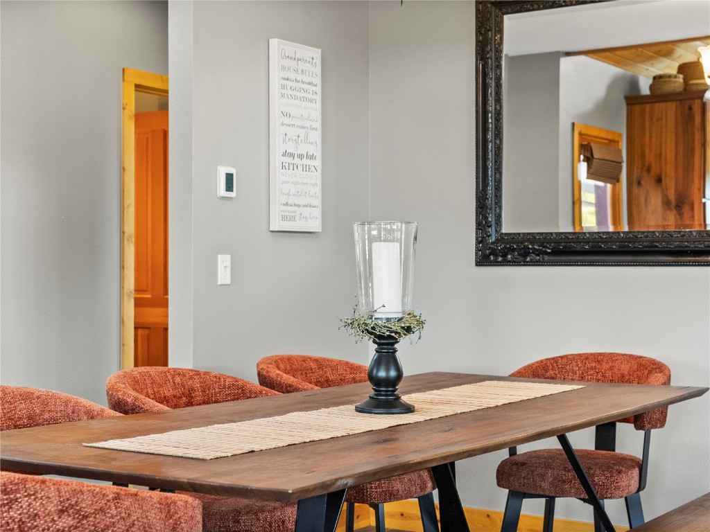 89 Emerald Road Silverthorne, CO 80498 - Photo 12 of 46 a bedroom with a table and chairs