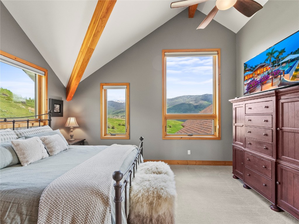 89 Emerald Road Silverthorne, CO 80498 - Photo 16 of 46 a bedroom with a bed and a dresser