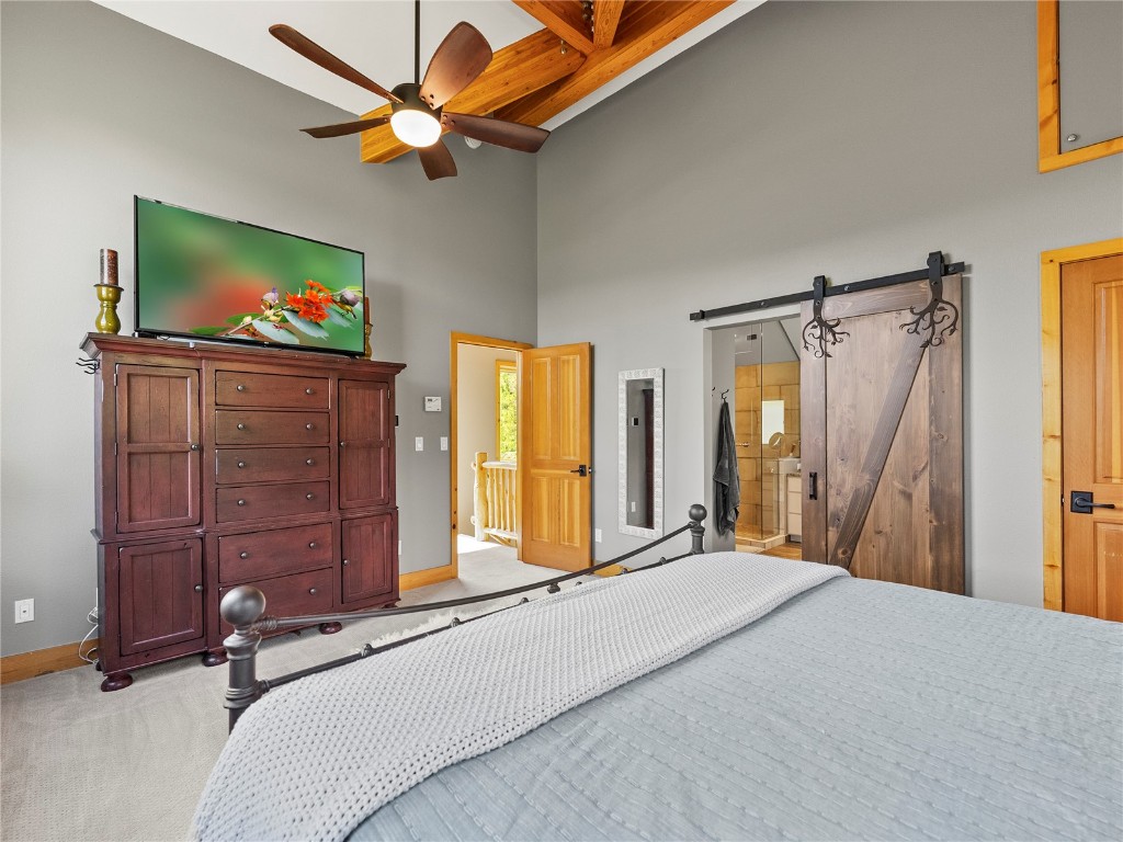 89 Emerald Road Silverthorne, CO 80498 - Photo 17 of 46 a bedroom with a bed and a flat screen tv