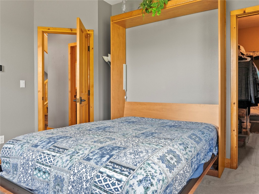 89 Emerald Road Silverthorne, CO 80498 - Photo 24 of 46 a bedroom with windows