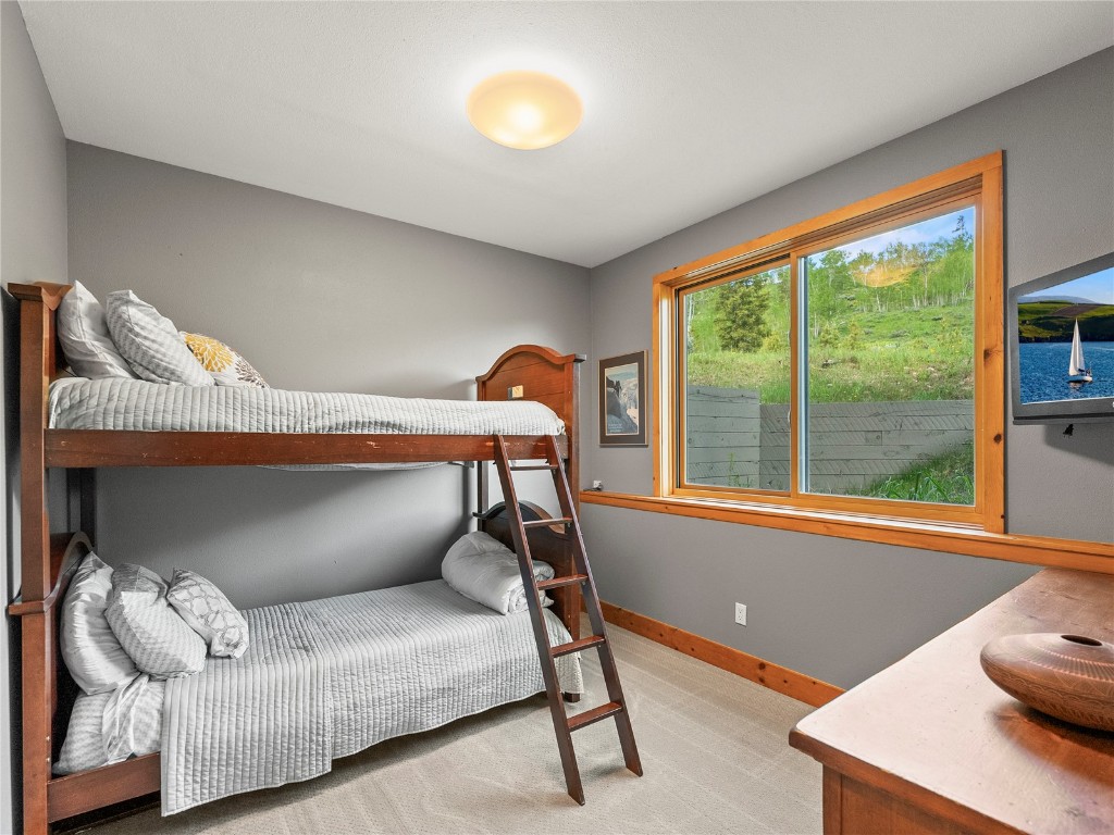 89 Emerald Road Silverthorne, CO 80498 - Photo 28 of 46 a bedroom with furniture and a window