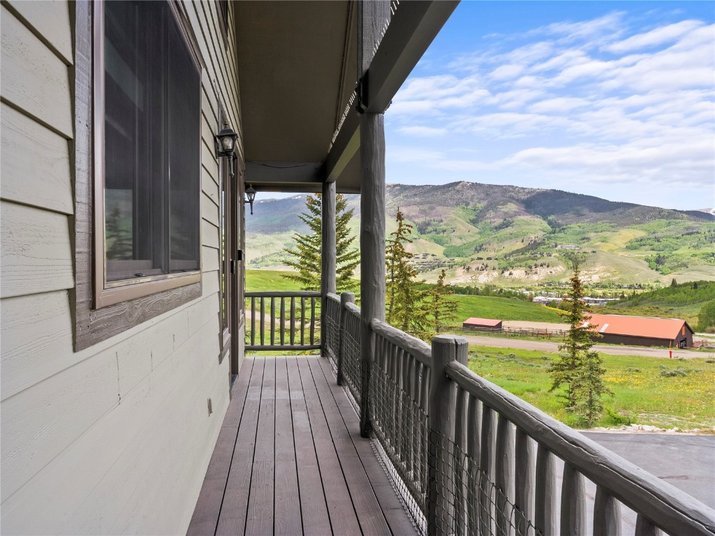 89 Emerald Road Silverthorne, CO 80498 - Photo 36 of 46 a view of balcony with wooden floor & fence