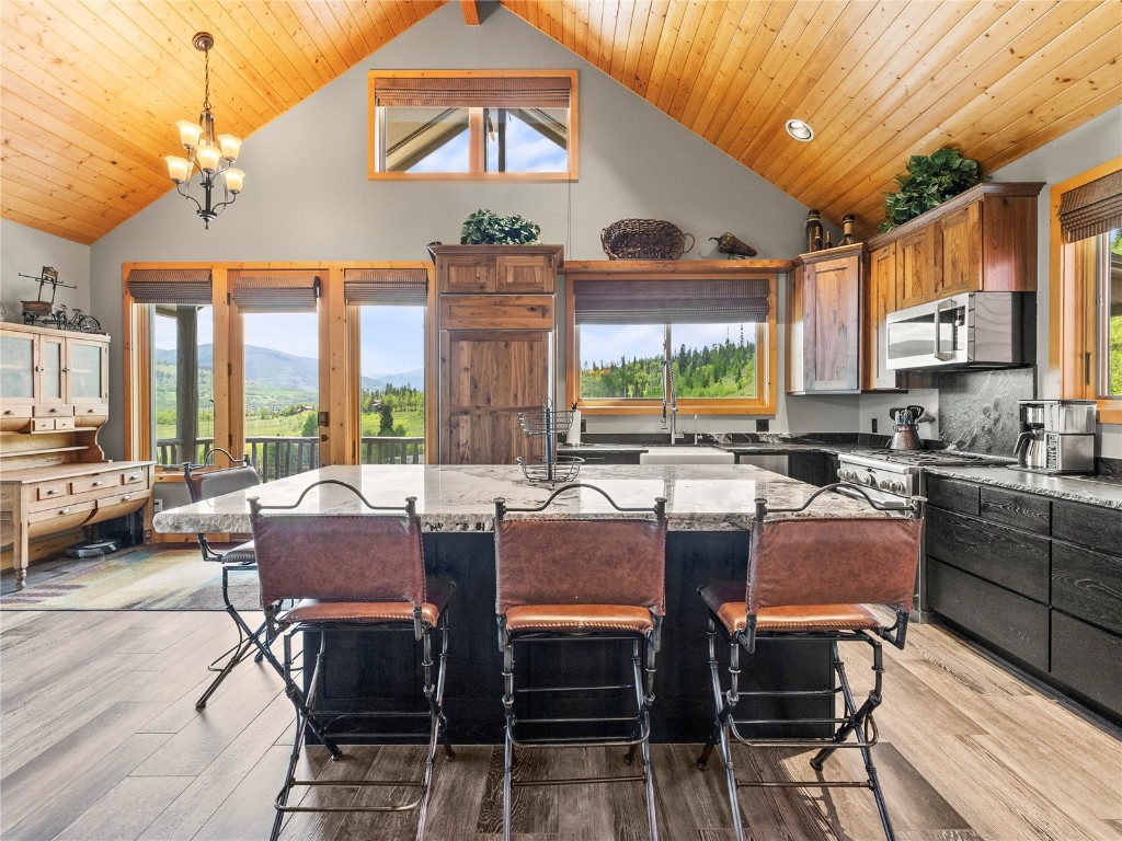 89 Emerald Road Silverthorne, CO 80498 - Photo 4 of 46 a view of a dining room with furniture window and outside view