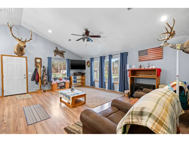 a bedroom with furniture and a chandelier