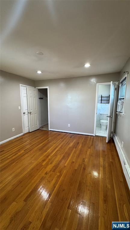 85 Eastern Way Rutherford, NJ 07070 - Photo 14 of 23 an empty room with wooden floor and entrance
