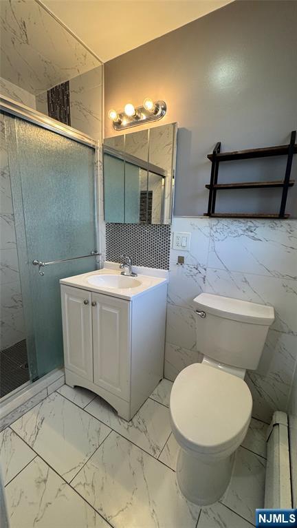 85 Eastern Way Rutherford, NJ 07070 - Photo 15 of 23 a bathroom with a sink a toilet and shower