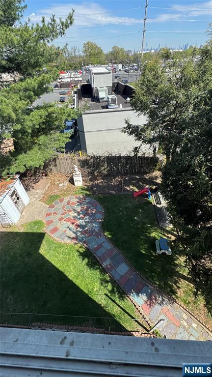 85 Eastern Way Rutherford, NJ 07070 - Photo 20 of 23 a view of a yard with an outdoor space