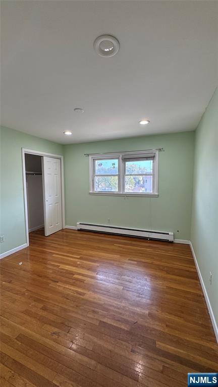 85 Eastern Way Rutherford, NJ 07070 - Photo 10 of 23 a view of empty room with wooden floor and fan