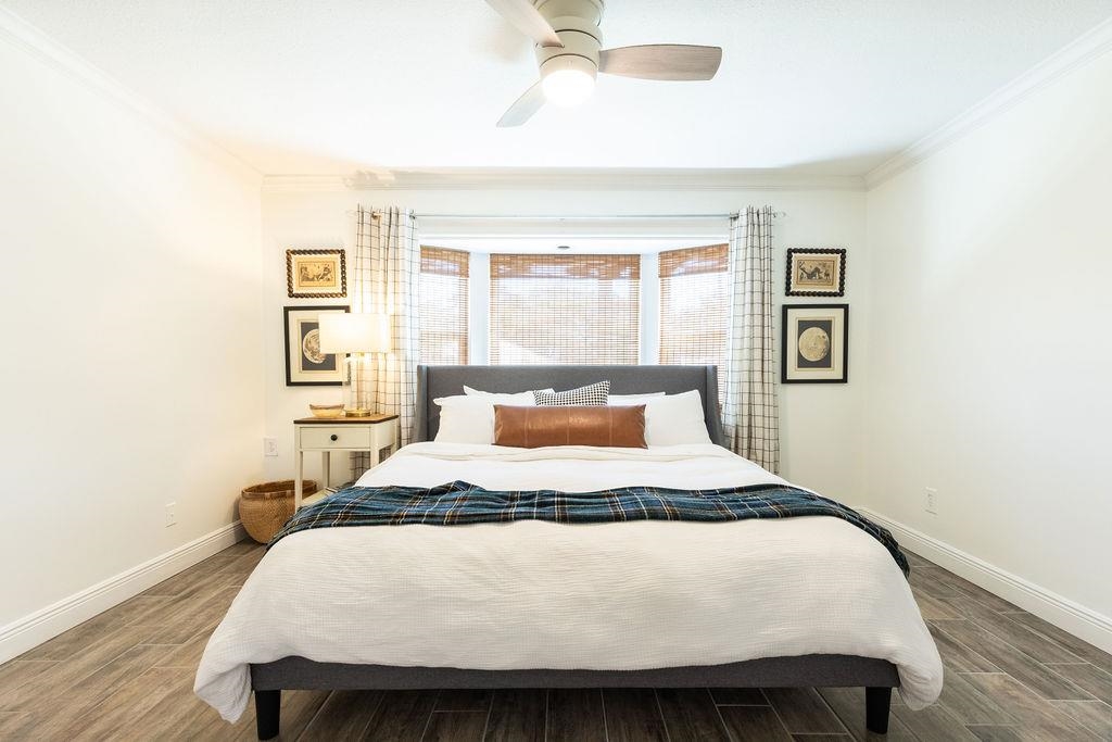 112 Drake Road St. Augustine, FL 32086 - Photo 27 of 59 a bedroom with a bed and a night stand