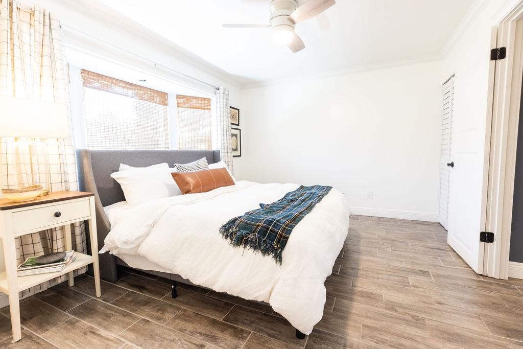 112 Drake Road St. Augustine, FL 32086 - Photo 29 of 59 a bedroom with a bed and a window