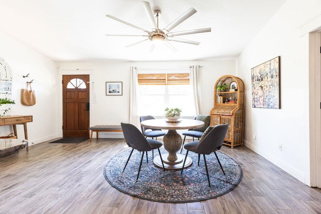 112 Drake Road St. Augustine, FL 32086 - Photo 3 of 59 a view of a dining room with furniture and wooden floor