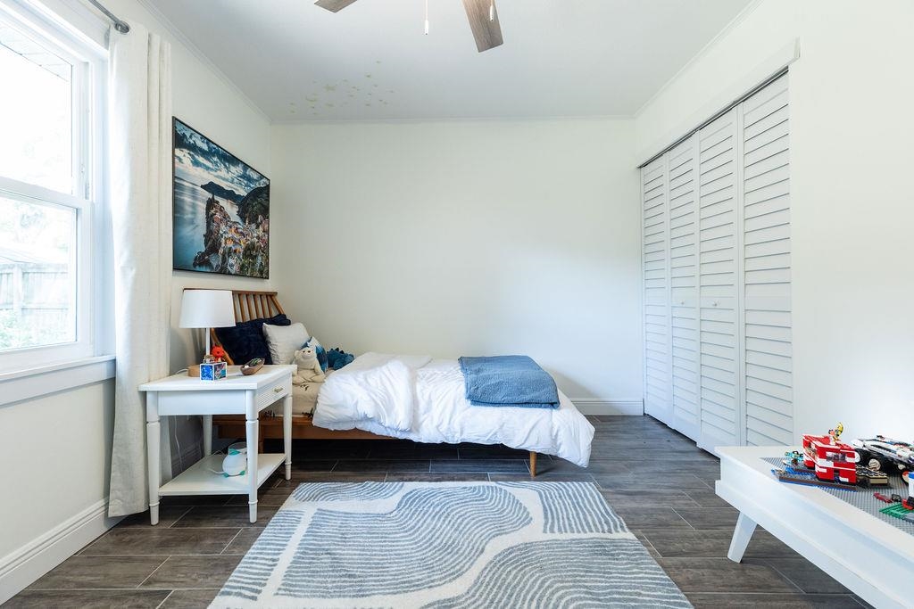 112 Drake Road St. Augustine, FL 32086 - Photo 37 of 59 a bed room with a bed and a window