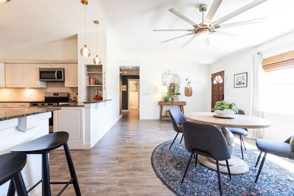 112 Drake Road St. Augustine, FL 32086 - Photo 5 of 59 a view of a dining room with furniture and wooden floor