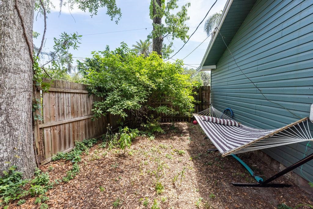 112 Drake Road St. Augustine, FL 32086 - Photo 51 of 59 a view of a backyard with a swing