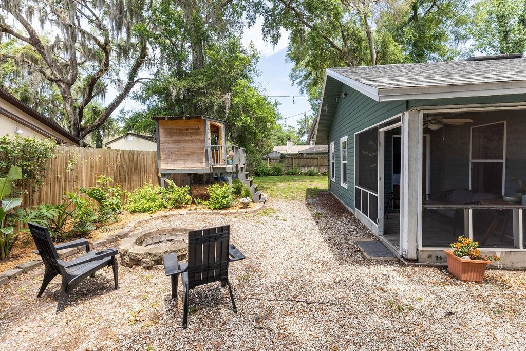 112 Drake Road St. Augustine, FL 32086 - Photo 55 of 59 a view of a house with backyard and sitting area