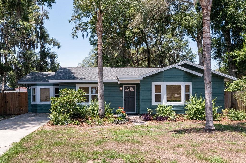 112 Drake Road St. Augustine, FL 32086 - Photo 56 of 59 a front view of house with yard and trees around