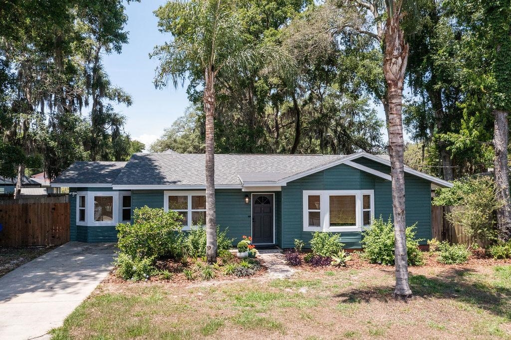 112 Drake Road St. Augustine, FL 32086 - Photo 57 of 59 a front view of a house with yard and seating area