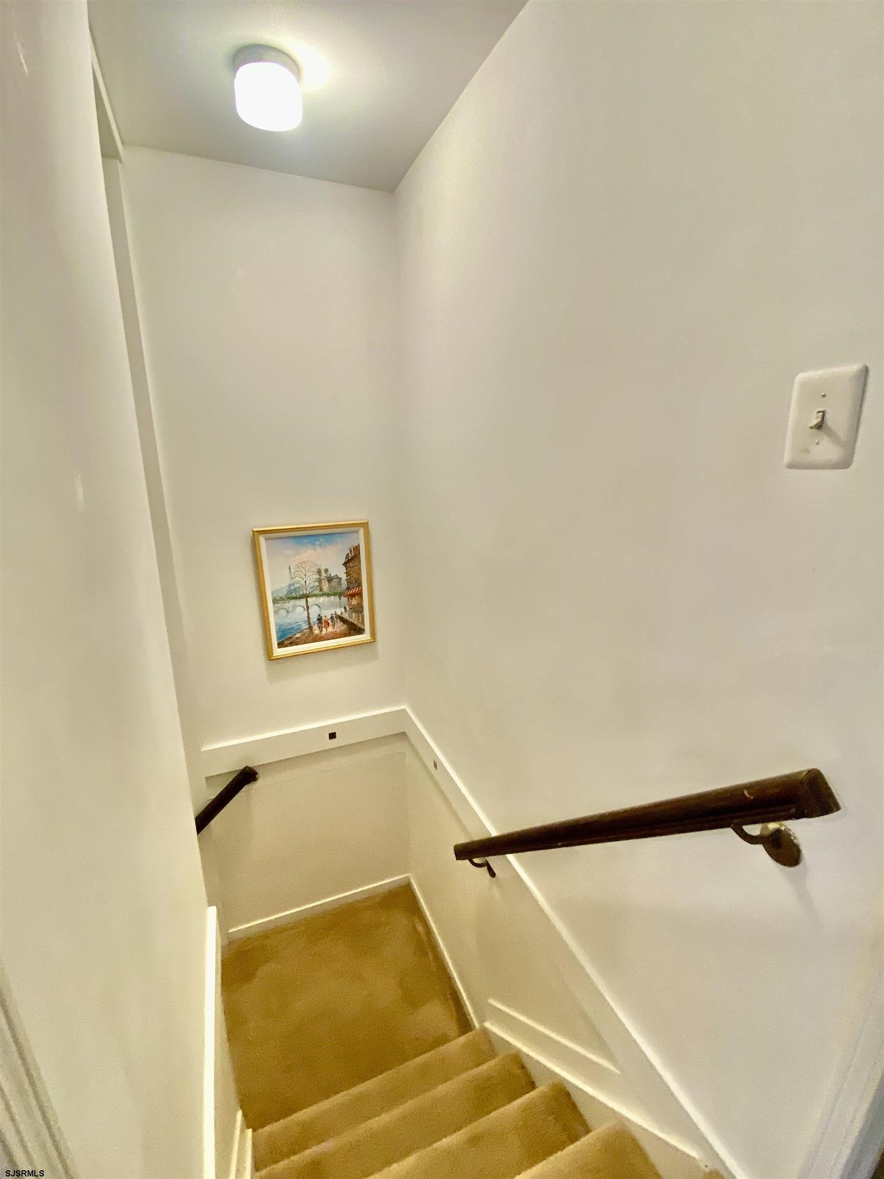 4 Ontario Drive, Unit B Brigantine, NJ 08203 - Photo 15 of 25 a view of a hallway