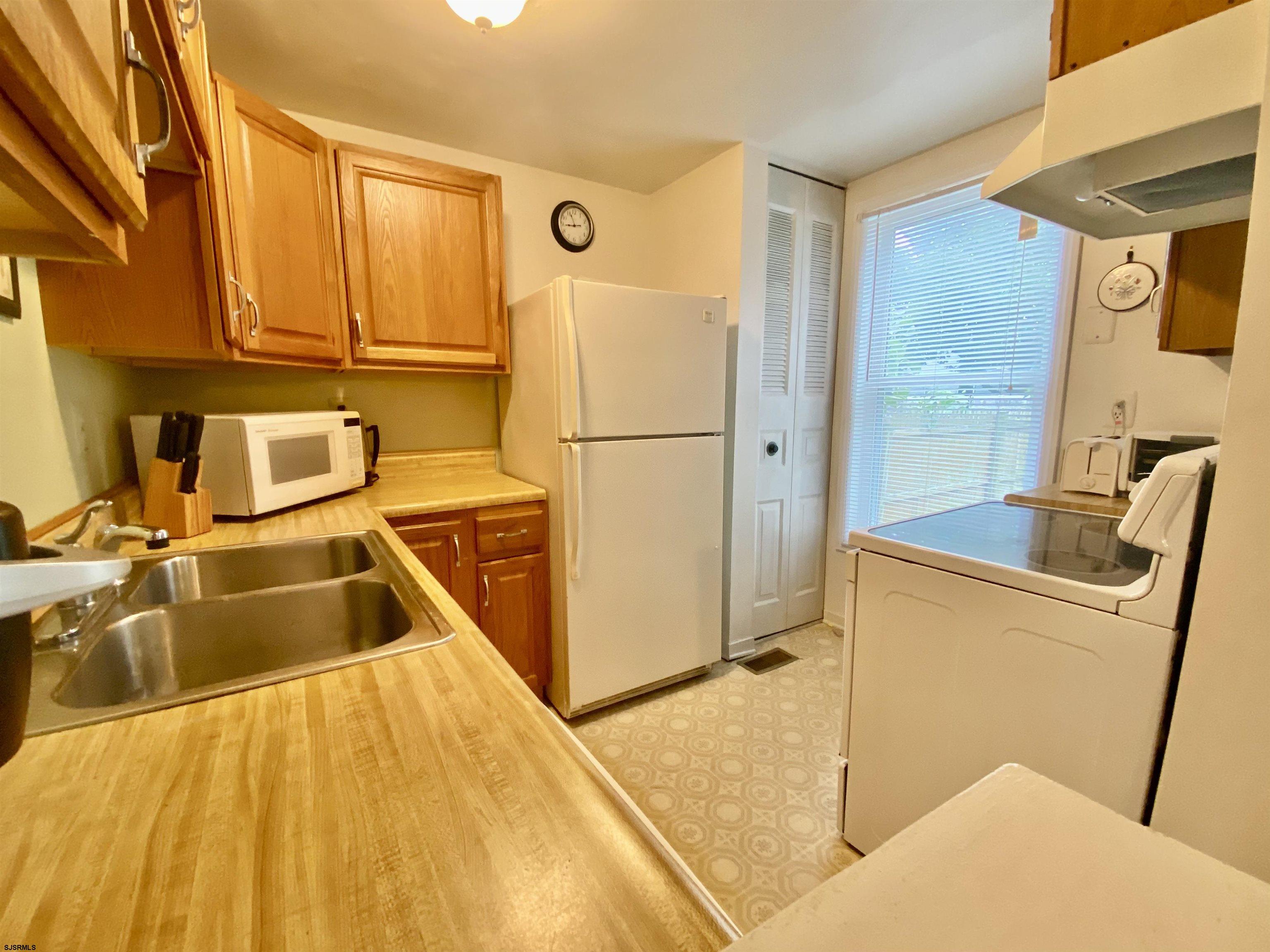 4 Ontario Drive, Unit B Brigantine, NJ 08203 - Photo 6 of 25 a room with storage and utility