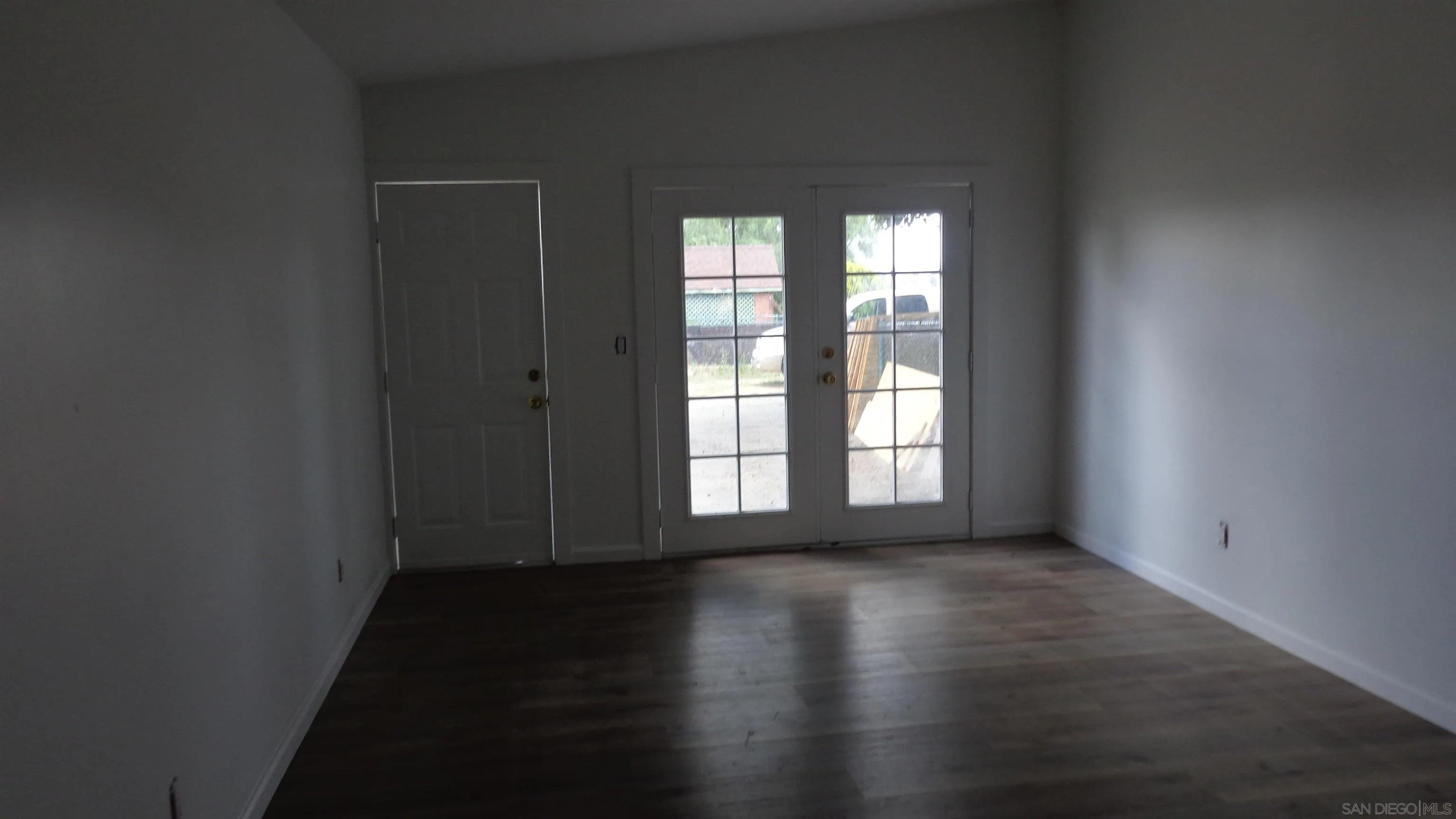 29660 Wilkes Road Valley Center, CA 92082 - Photo 10 of 16 a view of wooden floor and windows in a room
