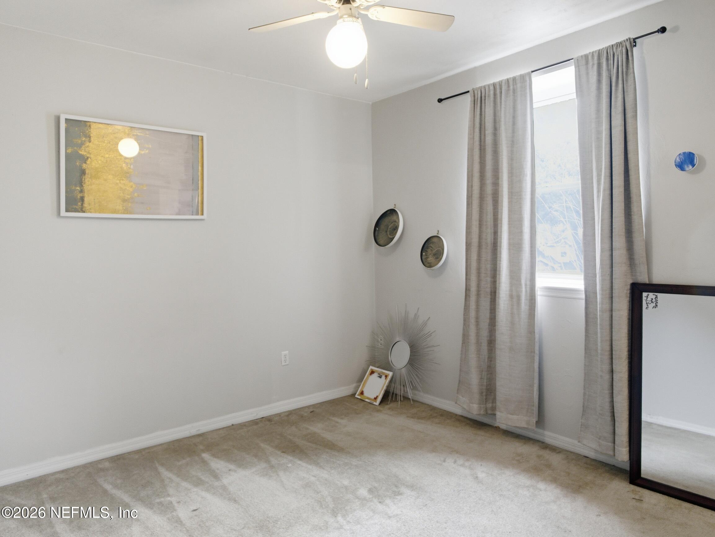 4700 Southwest Archer Road, Unit D27 Gainesville, FL 32608 - Photo 15 of 34 a view of a room with a chandeliers