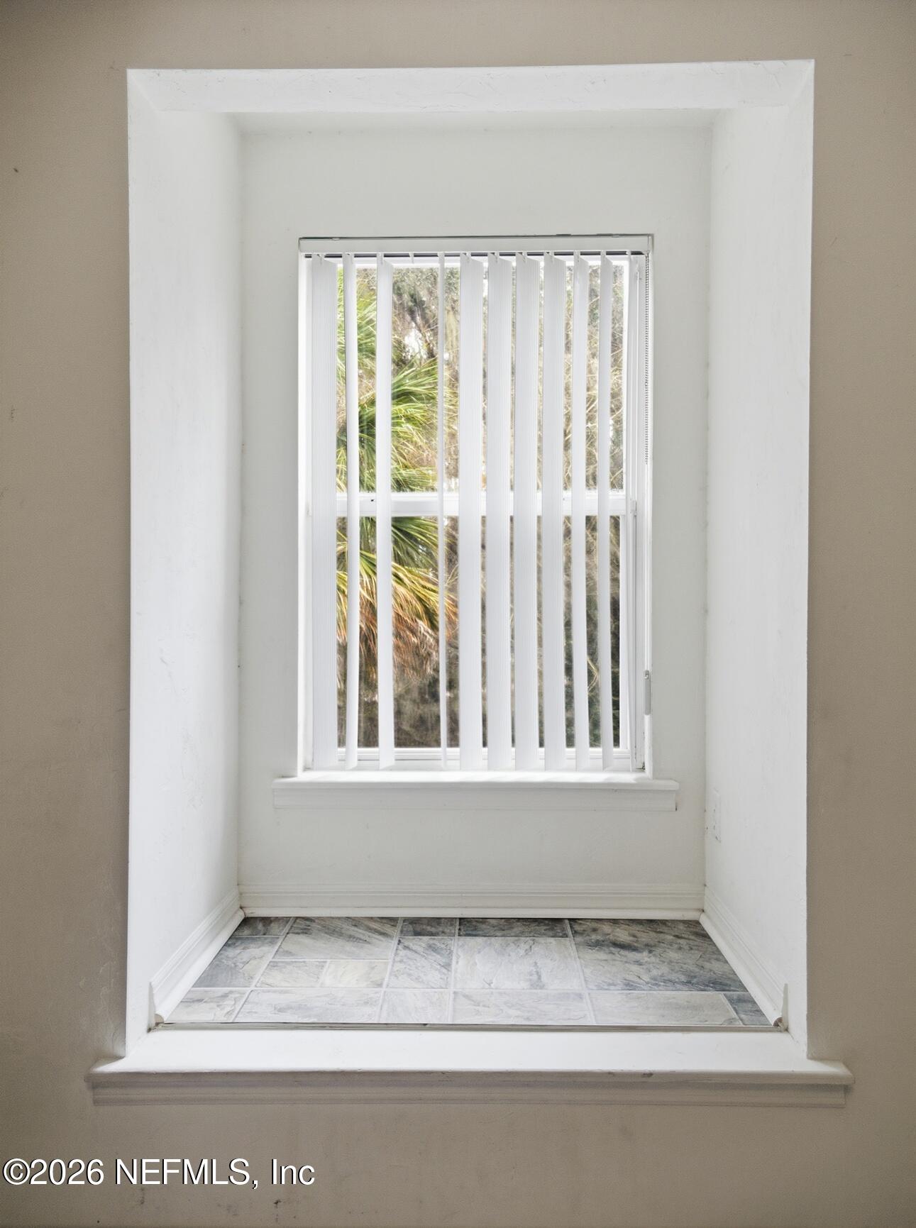 4700 Southwest Archer Road, Unit D27 Gainesville, FL 32608 - Photo 22 of 34 a view of wooden floor and a window