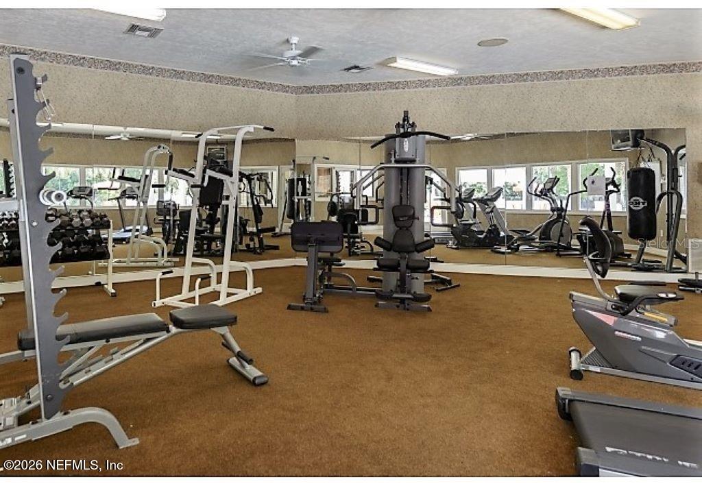 4700 Southwest Archer Road, Unit D27 Gainesville, FL 32608 - Photo 31 of 34 a view of a room with gym equipment
