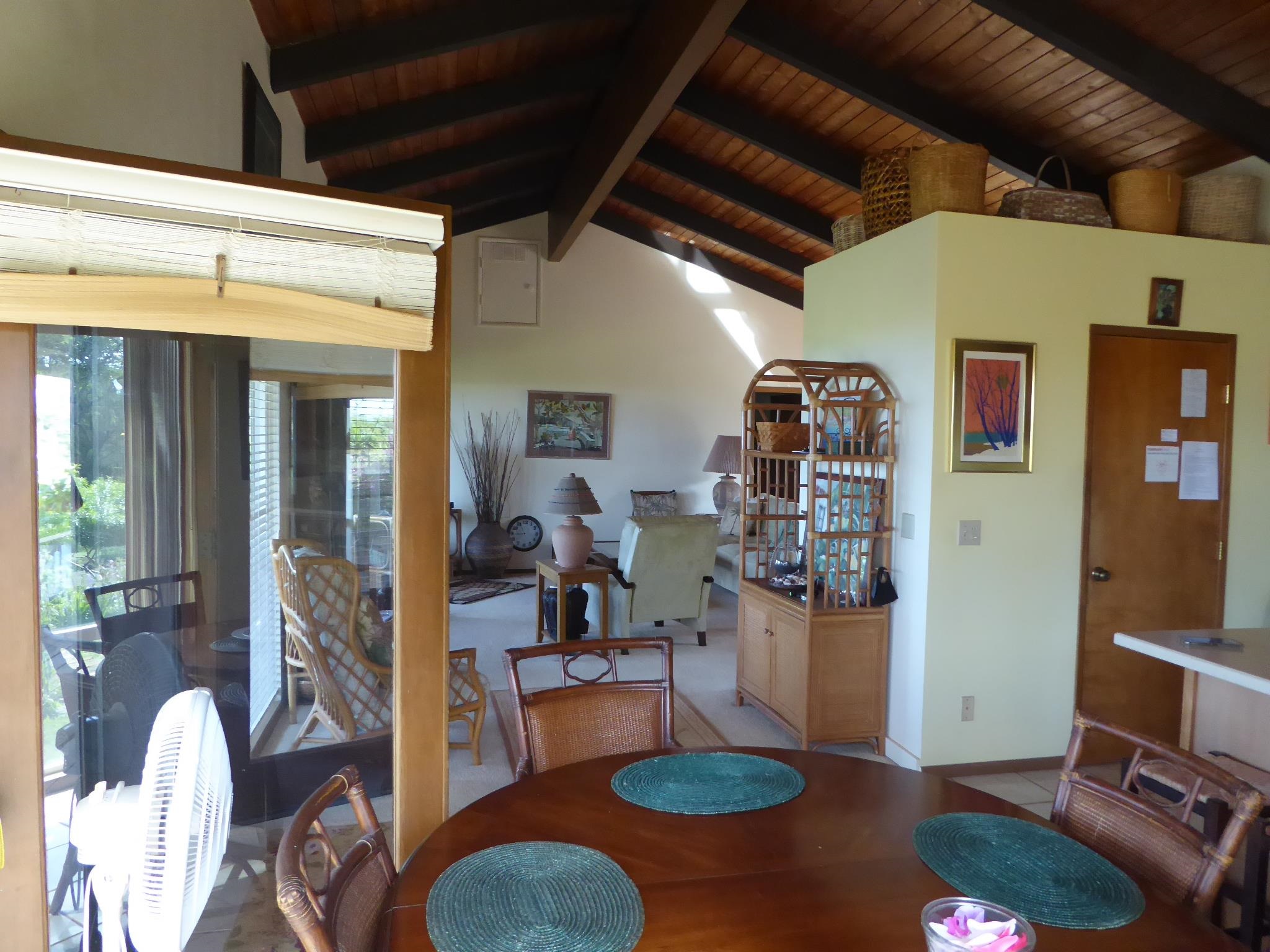 91 Noho Lio Road Maunaloa, HI 96770 - Photo 15 of 27 a livingroom with furniture a rug and wooden floor