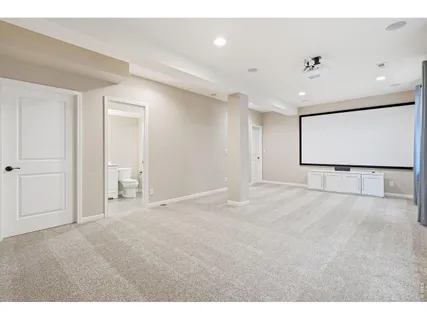 a view of room with wooden floor