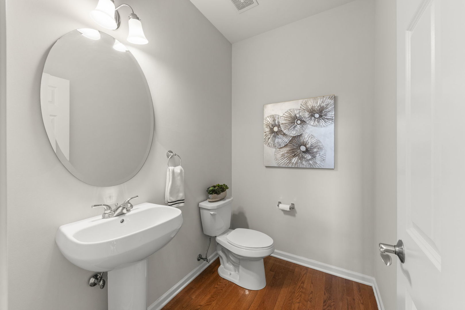 26500 Rustling Birch Way Plainfield, IL 60585 - Photo 15 of 37 a bathroom with a toilet a sink and a mirror