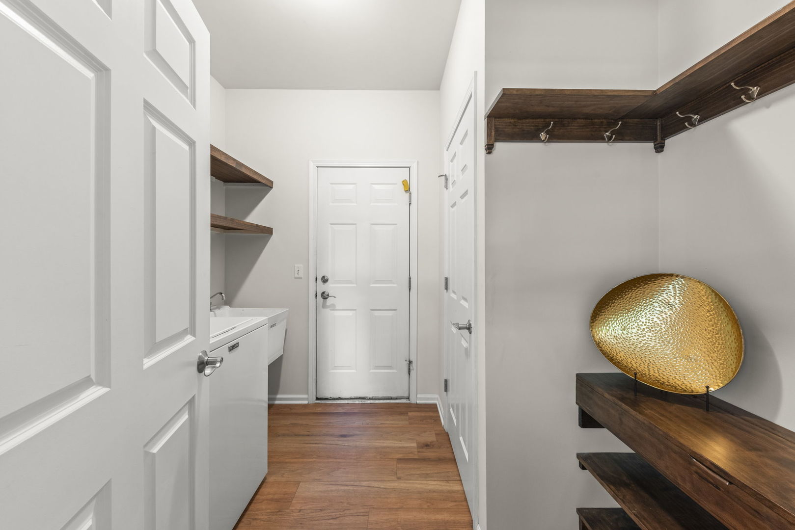 26500 Rustling Birch Way Plainfield, IL 60585 - Photo 16 of 37 a view of a hallway with wooden floor and entryway