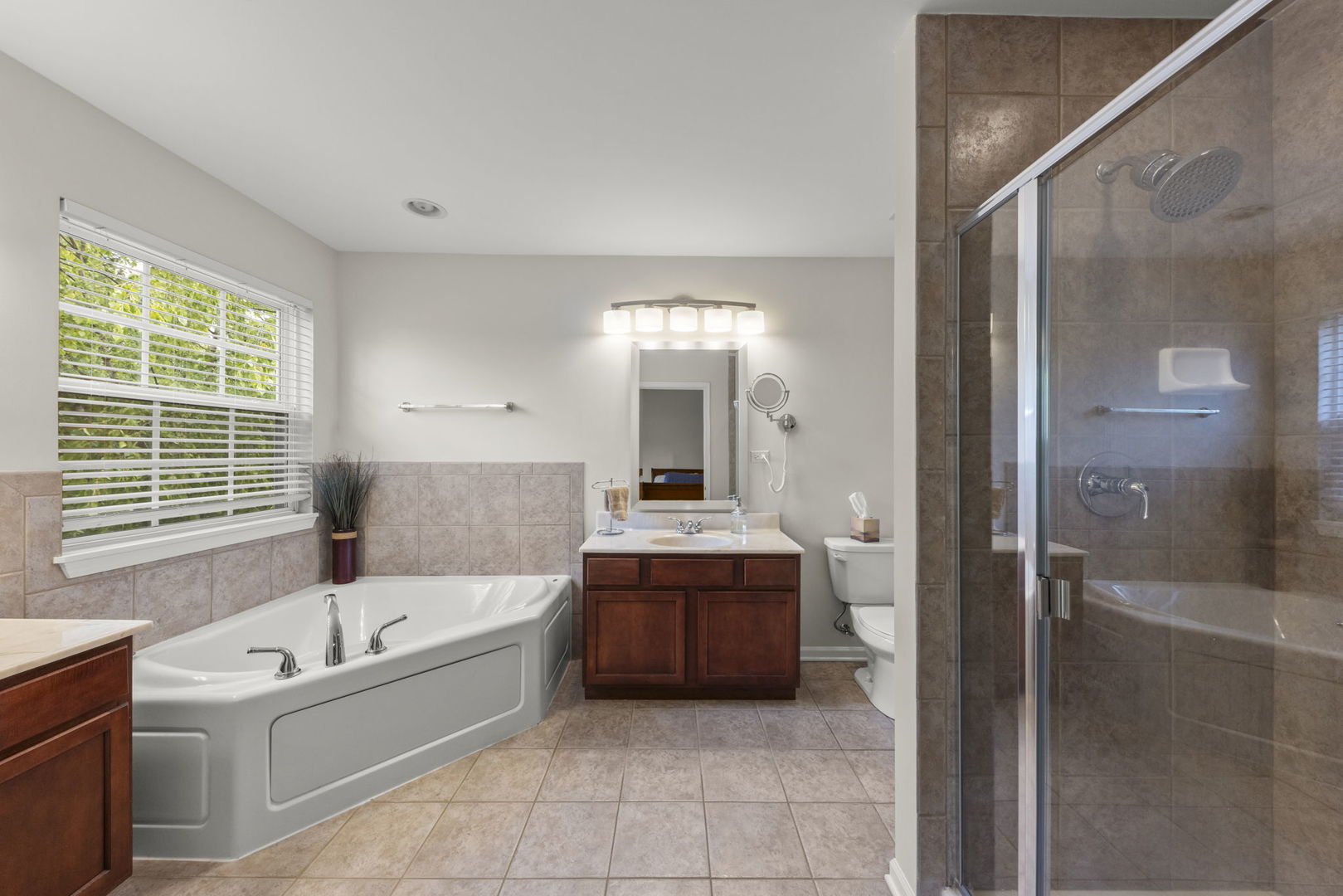 26500 Rustling Birch Way Plainfield, IL 60585 - Photo 21 of 37 a bathroom with a tub shower and sink