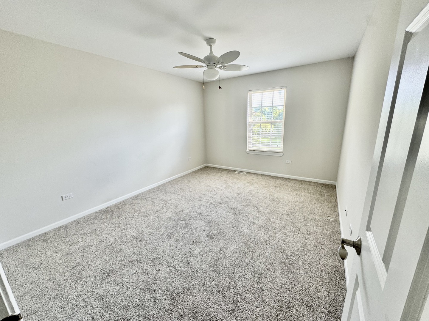 26500 Rustling Birch Way Plainfield, IL 60585 - Photo 25 of 37 an empty room with a window
