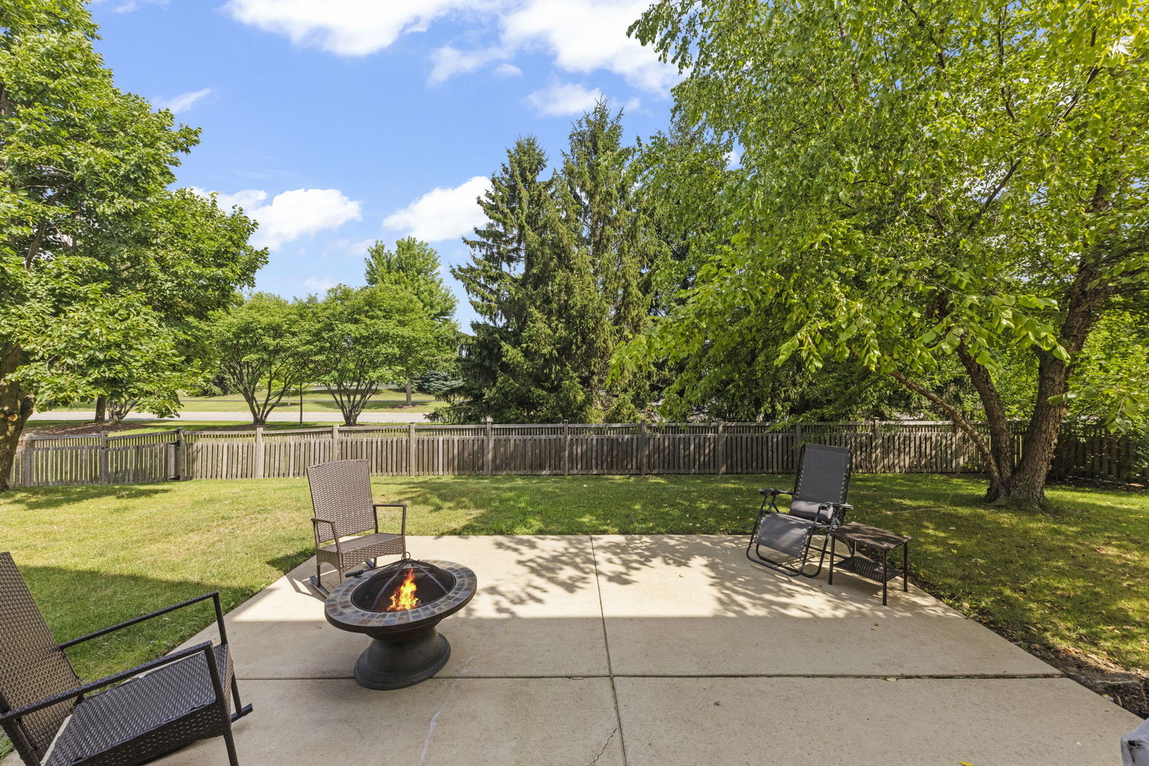 26500 Rustling Birch Way Plainfield, IL 60585 - Photo 28 of 37 a view of a lake with a patio