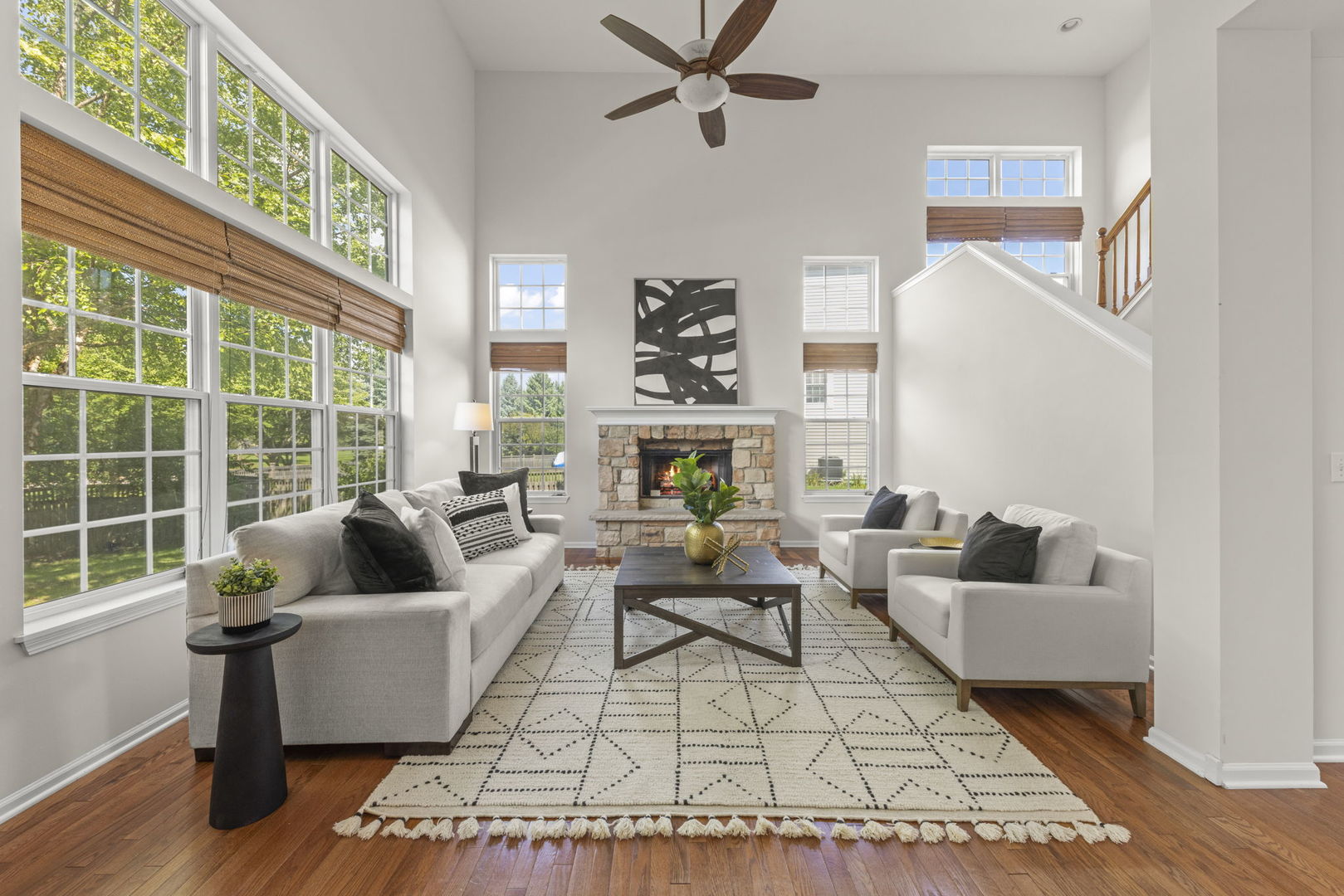 26500 Rustling Birch Way Plainfield, IL 60585 - Photo 6 of 37 a living room with furniture and a floor to ceiling window